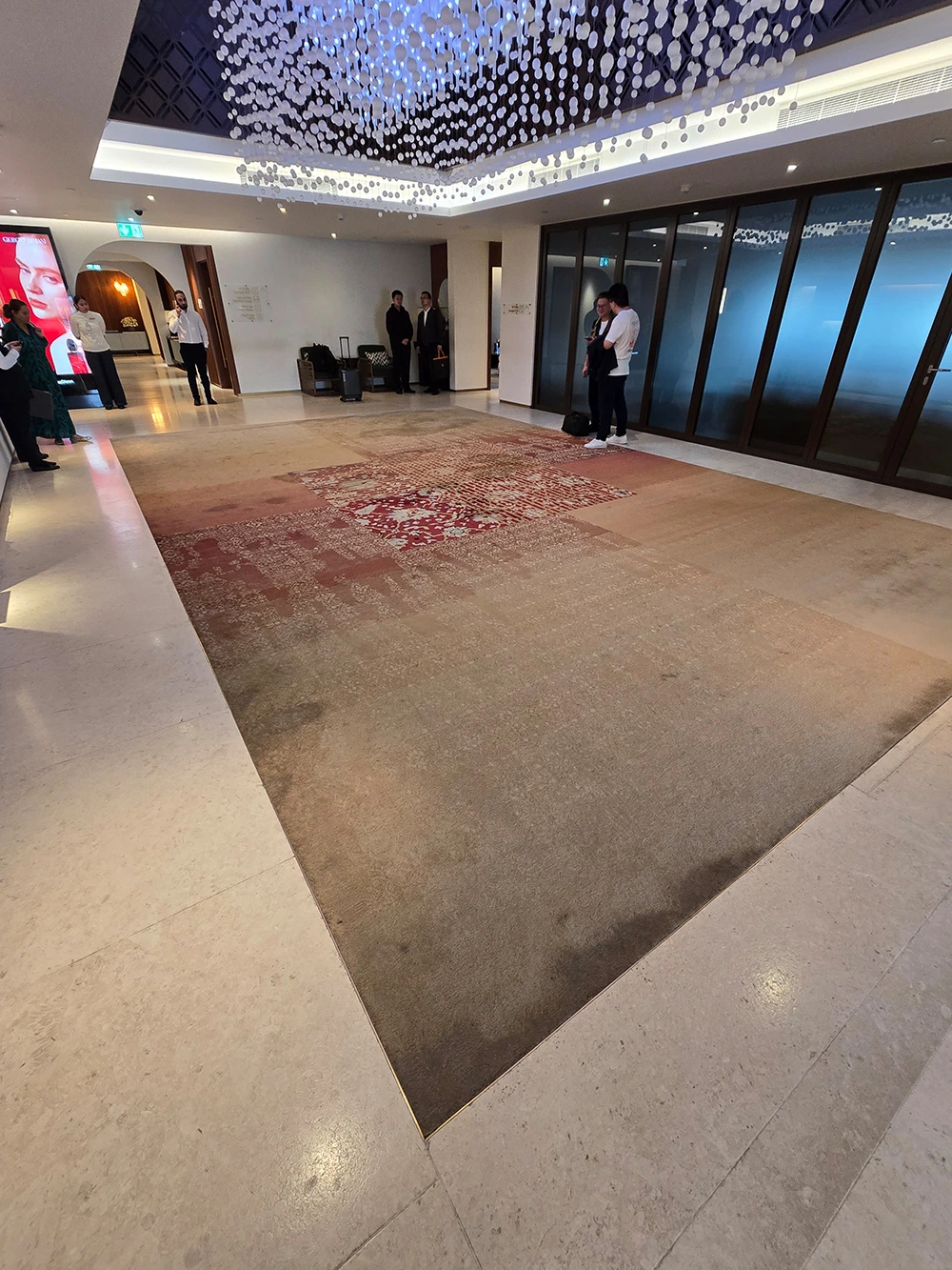 Base and over-tuft design in New Zealand wool rug
